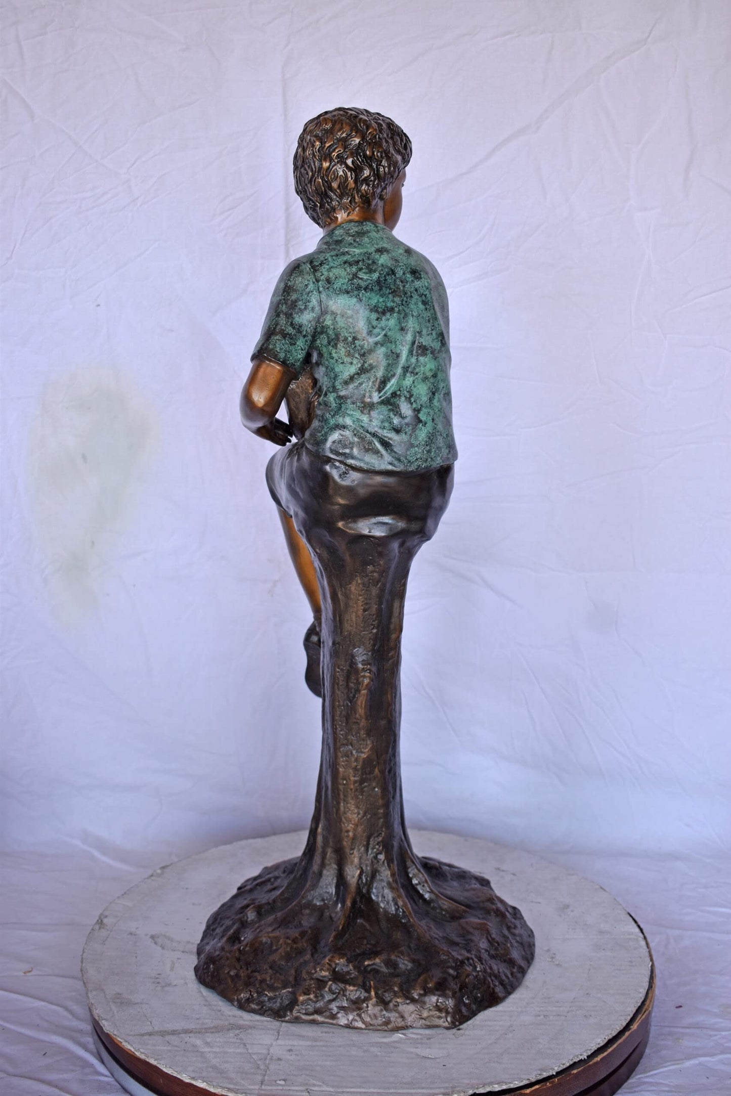 Boy Sitting on A Log with His Puppy Bronze Statue - Size: 15"L x 15"W x 35"H.