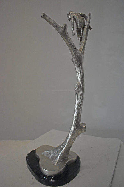Monkey Resting on a Tree Silver Finish Bronze Statue - Size: 12" x 13" x 27"H.
