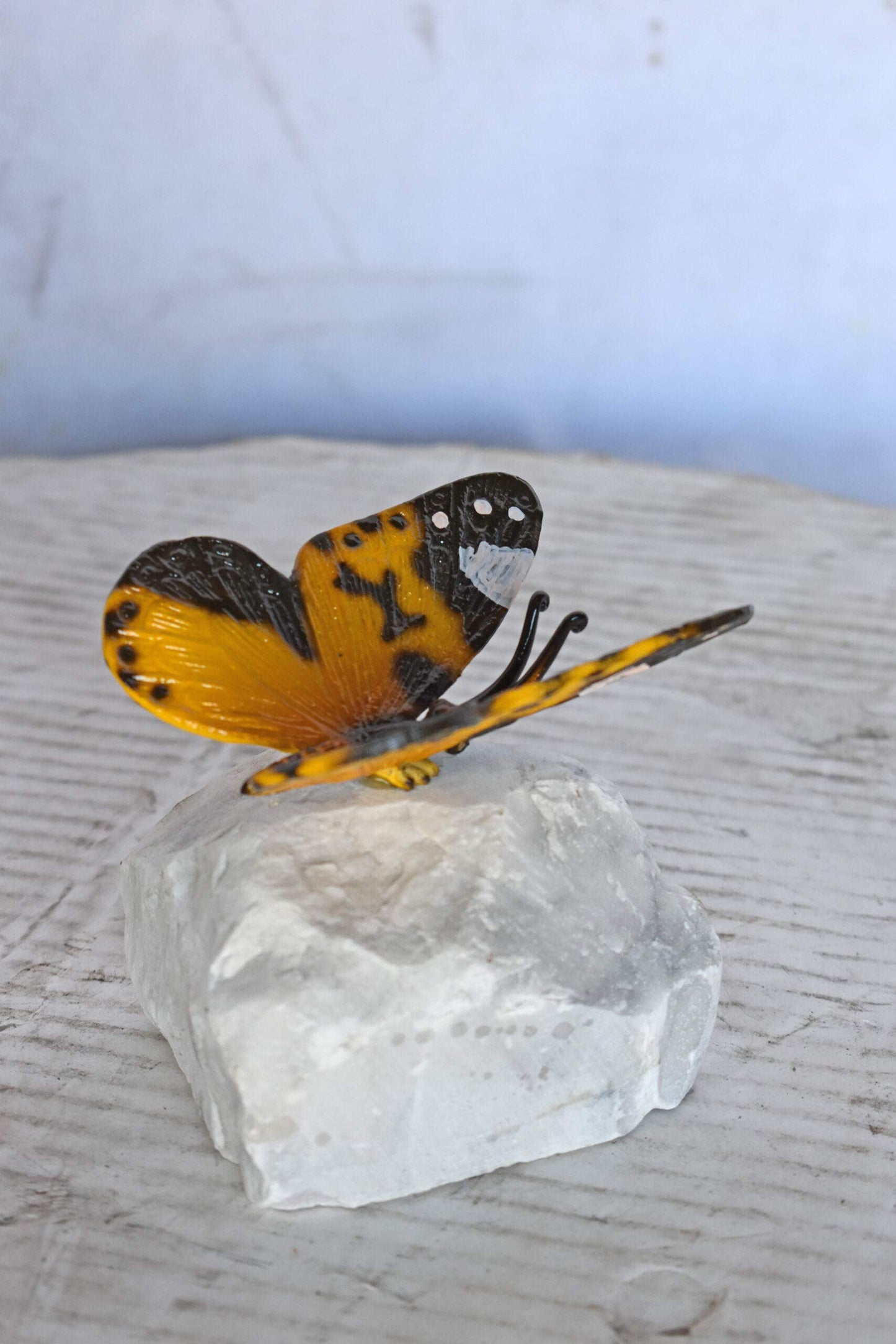 Orange Butterfly made of Bronze mounted on a rock - Size: 5"L x 5"W x 4"H.