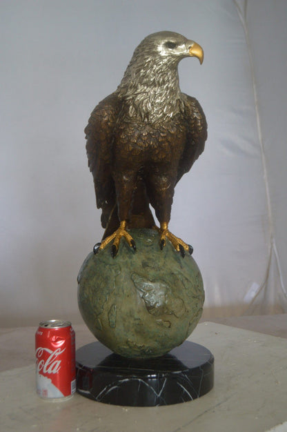Bald Eagle Standing on a Globe Bronze Statue -  Size: 17"L x 9"W x 23"H.