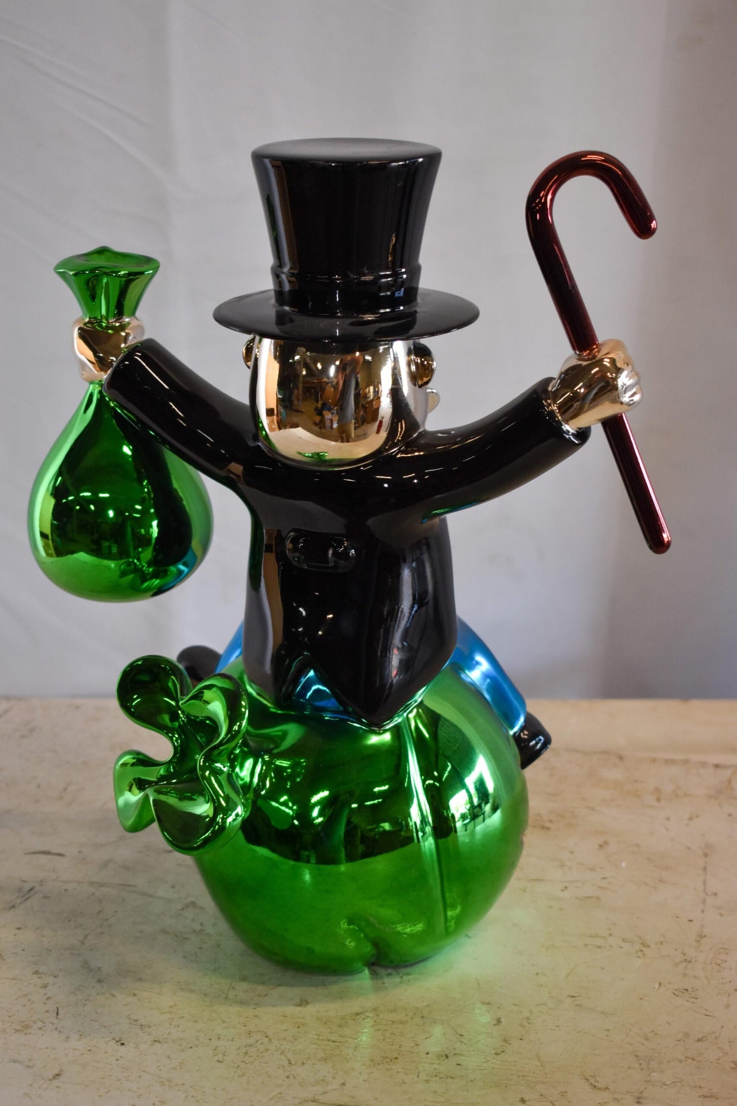 Joyous Monopoly Man Sitting on Money Bag Resin Statue 12" x 10" x 16"H