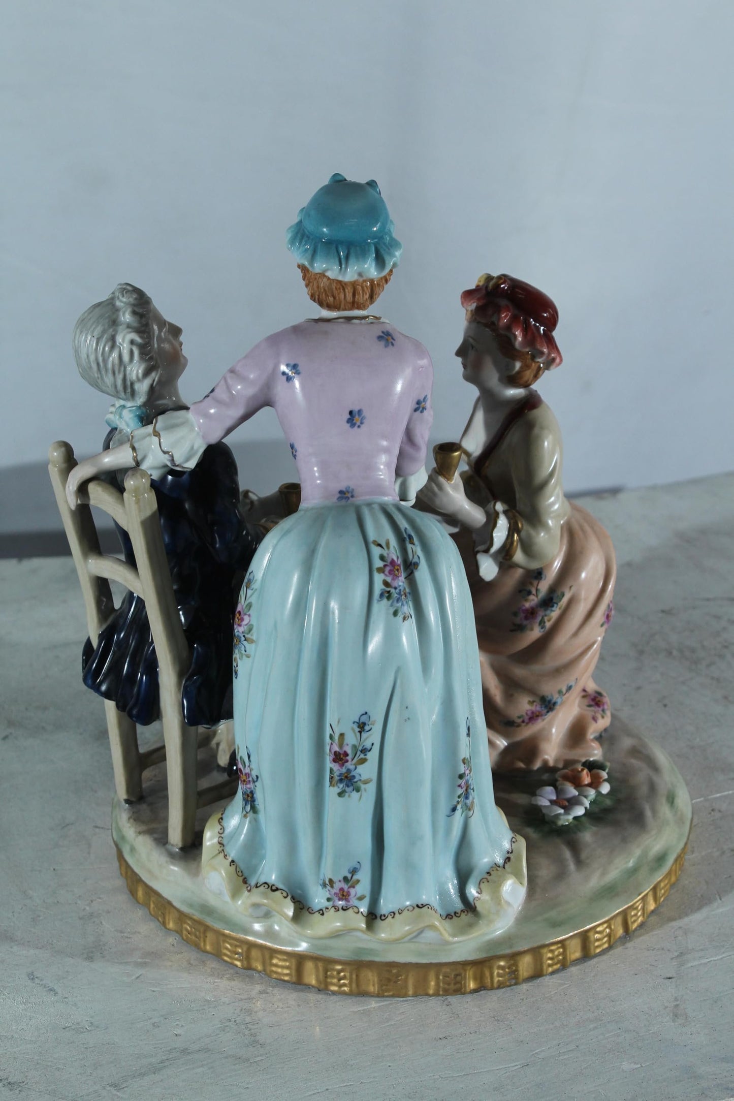 NIFAO Porcelain Figurine Group at Table with Cups 10"x10"x13"H