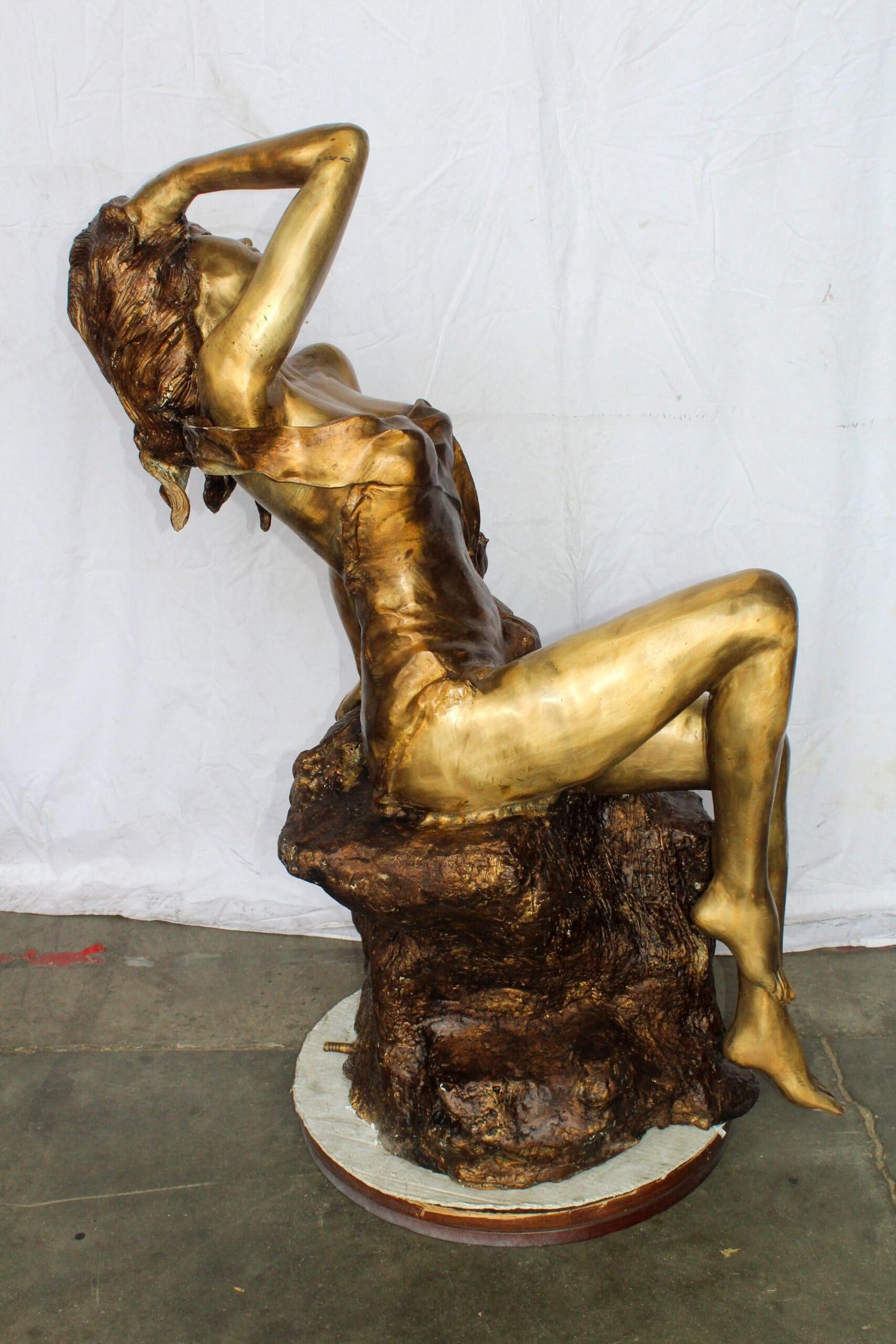 Bronze Outdoor Fountain of a Woman Relaxing on Rocks 49" x 39" x 50"H