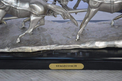 M Russell, Silver Stagecoach Replica Bronze Statue -  Size: 38"L x 10"W x 12"H.