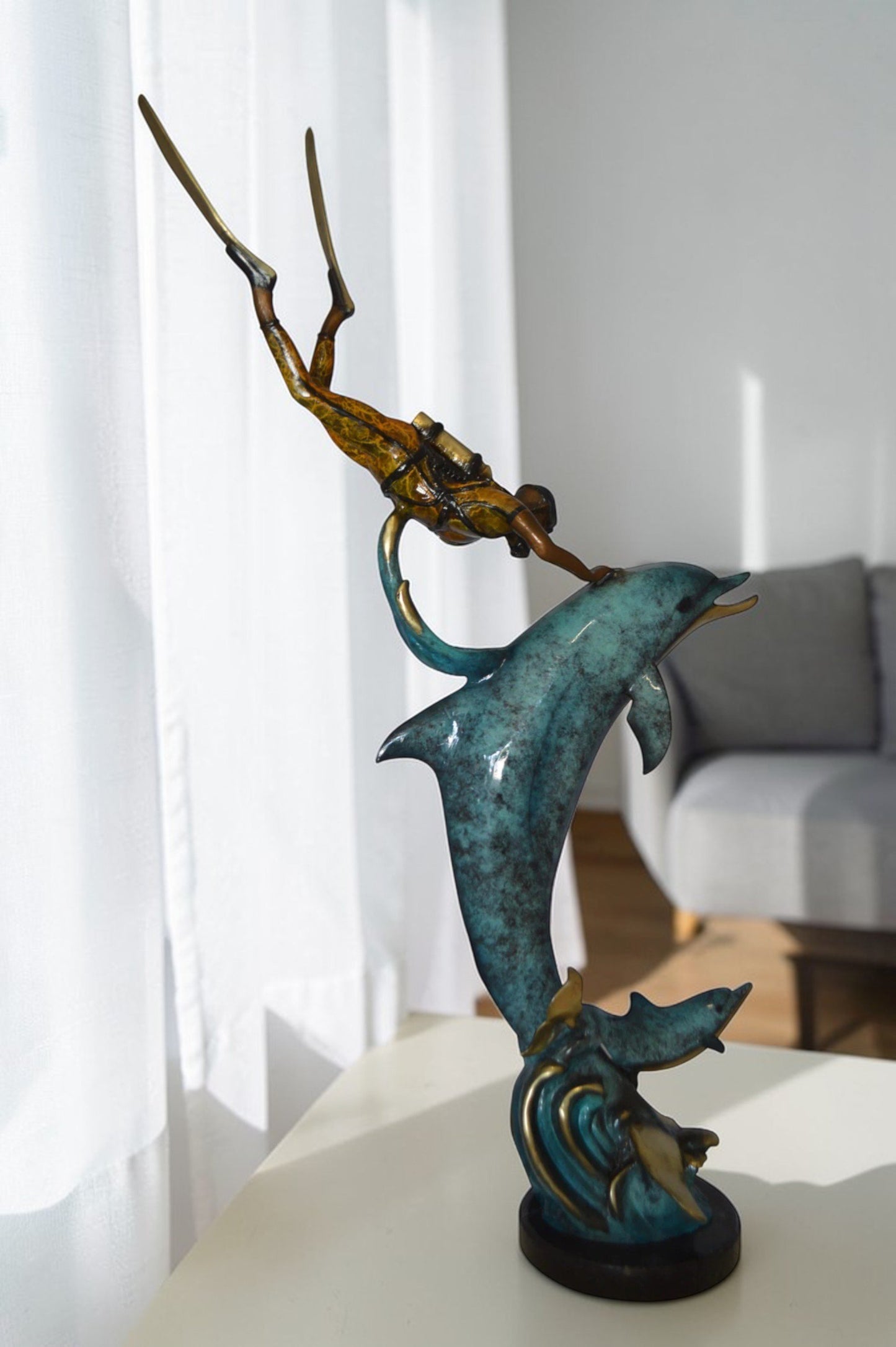 Diver With Dolphin Bronze Statue -  Size: 10"L x 30"W x 49"H.
