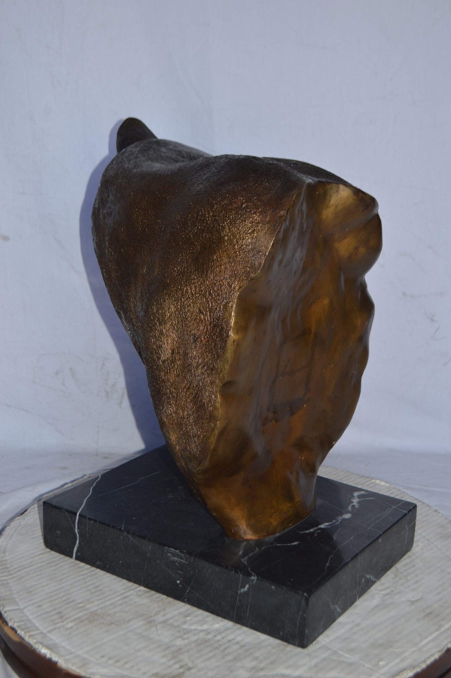 Mountain Lion Head bronze statue on a marble base - Size: 18"L x 15"W x 21"H.