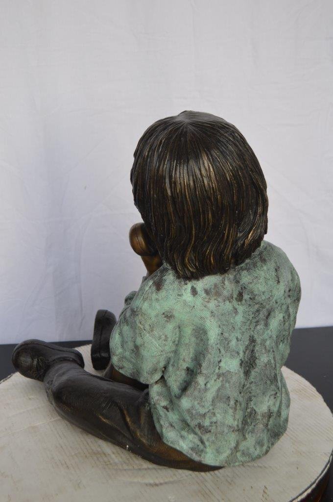 Young Child With an Old Telephone Bronze Statue -  Size: 21"L x 14"W x 19"H.