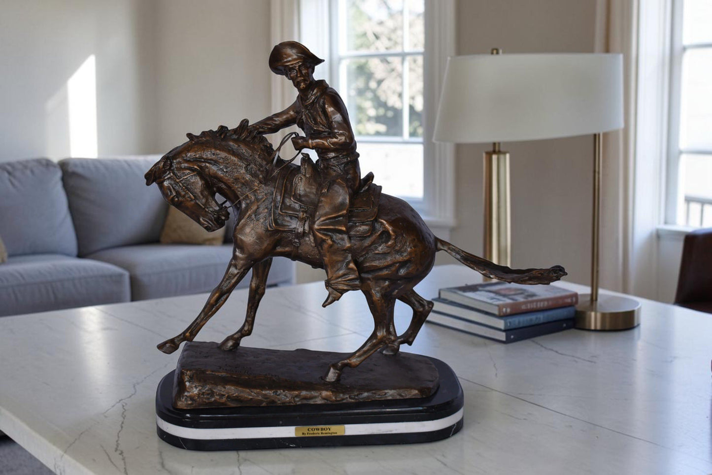 Remington Cowboy Replica Bronze Statue on Triple Marble - Size: 8"x 26"x 23"H.