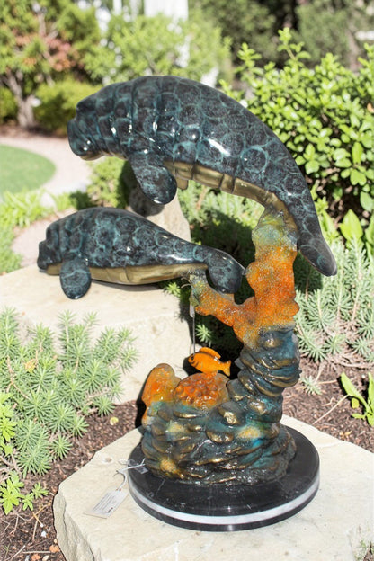 Manatees swimming - large Bronze Statue -  Size: 18"L x 28"W x 38"H.
