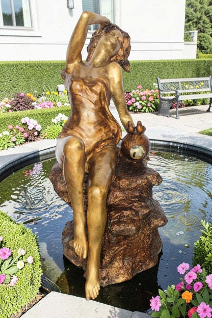 Bronze Outdoor Fountain of a Woman Relaxing on Rocks 49" x 39" x 50"H