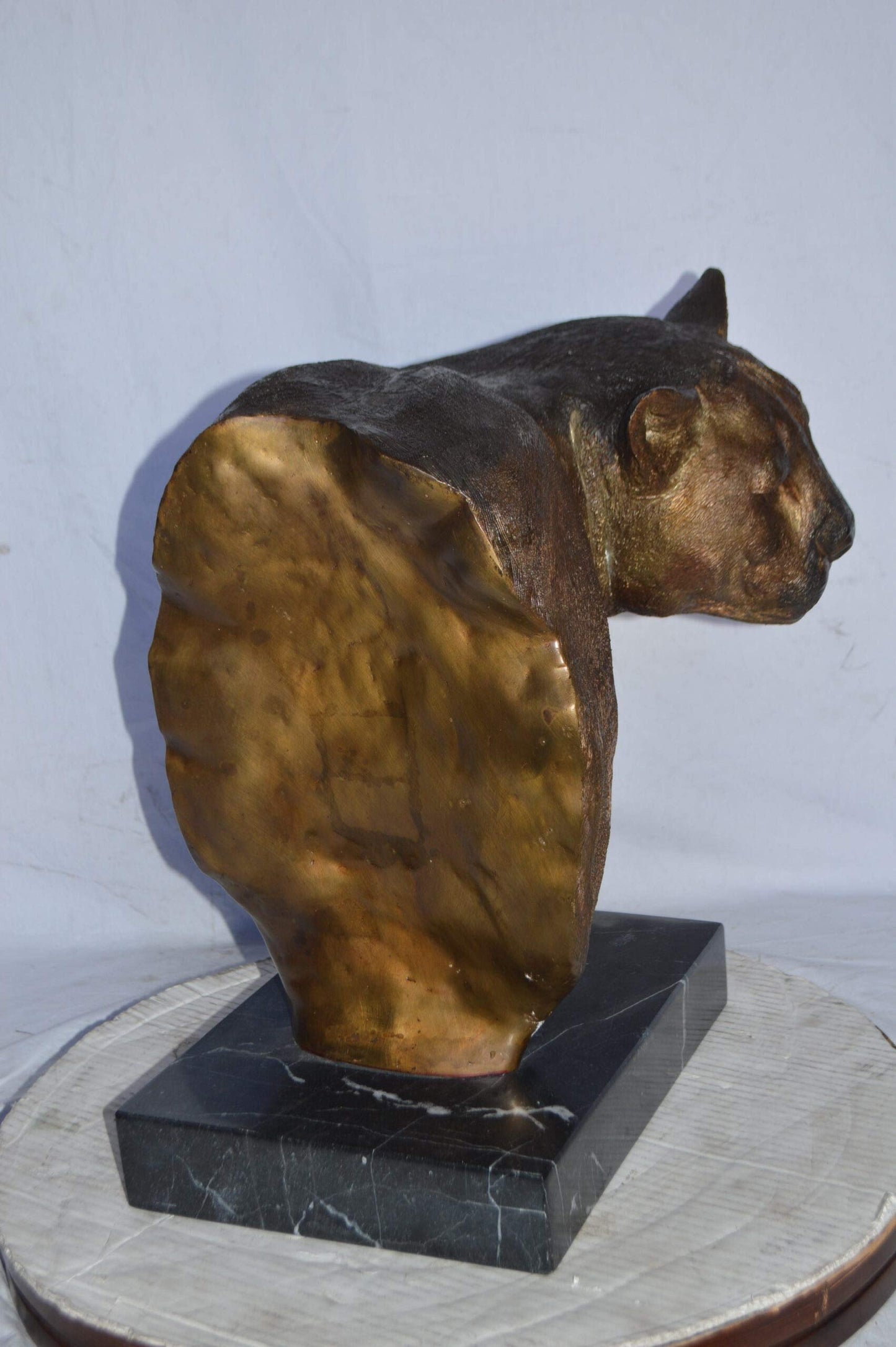 Mountain Lion Head bronze statue on a marble base - Size: 18"L x 15"W x 21"H.
