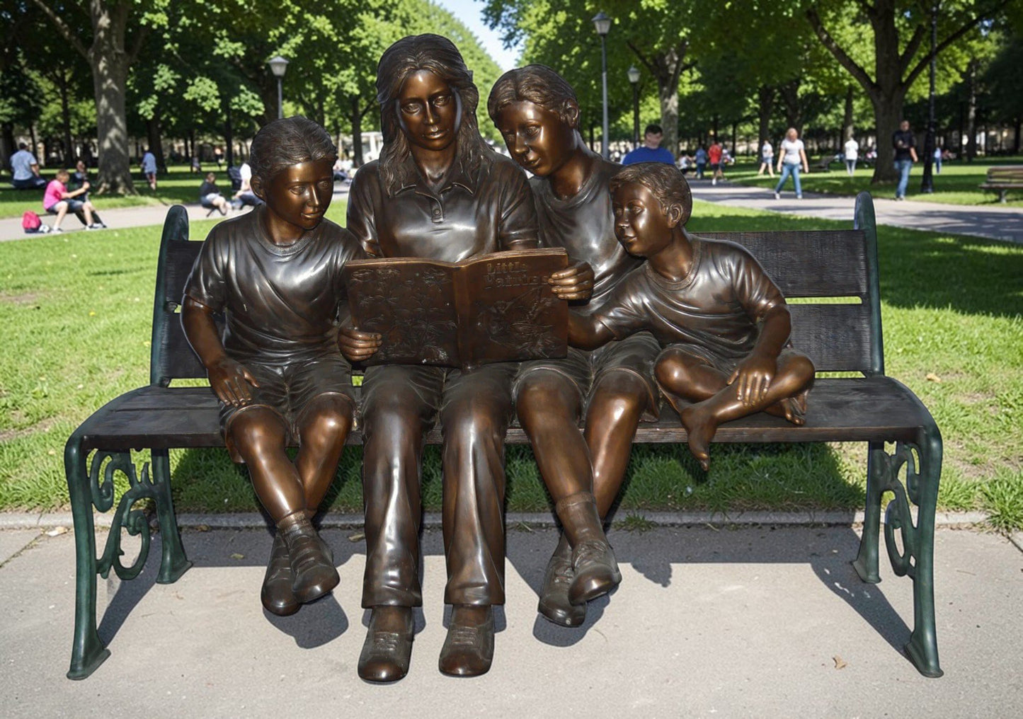 Mom and boys reading stories on bench bronze statue - Size: 53"L x 33"W x 39"H.