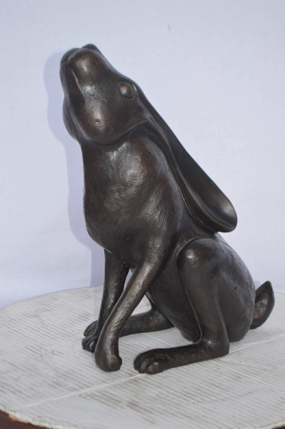 Rabbit Gazing Up Bronze Statue - Size: 8"L x 14"W x 16"H.