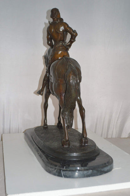 Man on his Horse Bronze Statue -  Size: 30"L x 10"W x 25"H.