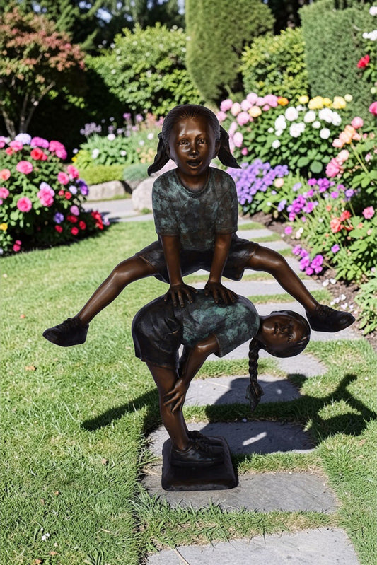 Two Girls Playing Leapfrog Jumping Bronze Statue - Size: 30"L x 14"W x 34"H.