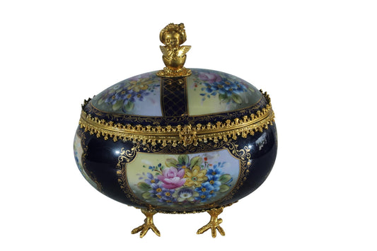 NIFAO Porcelain floral egg shaped lidded box with cherub and chicken feet 11"x8"x12"H