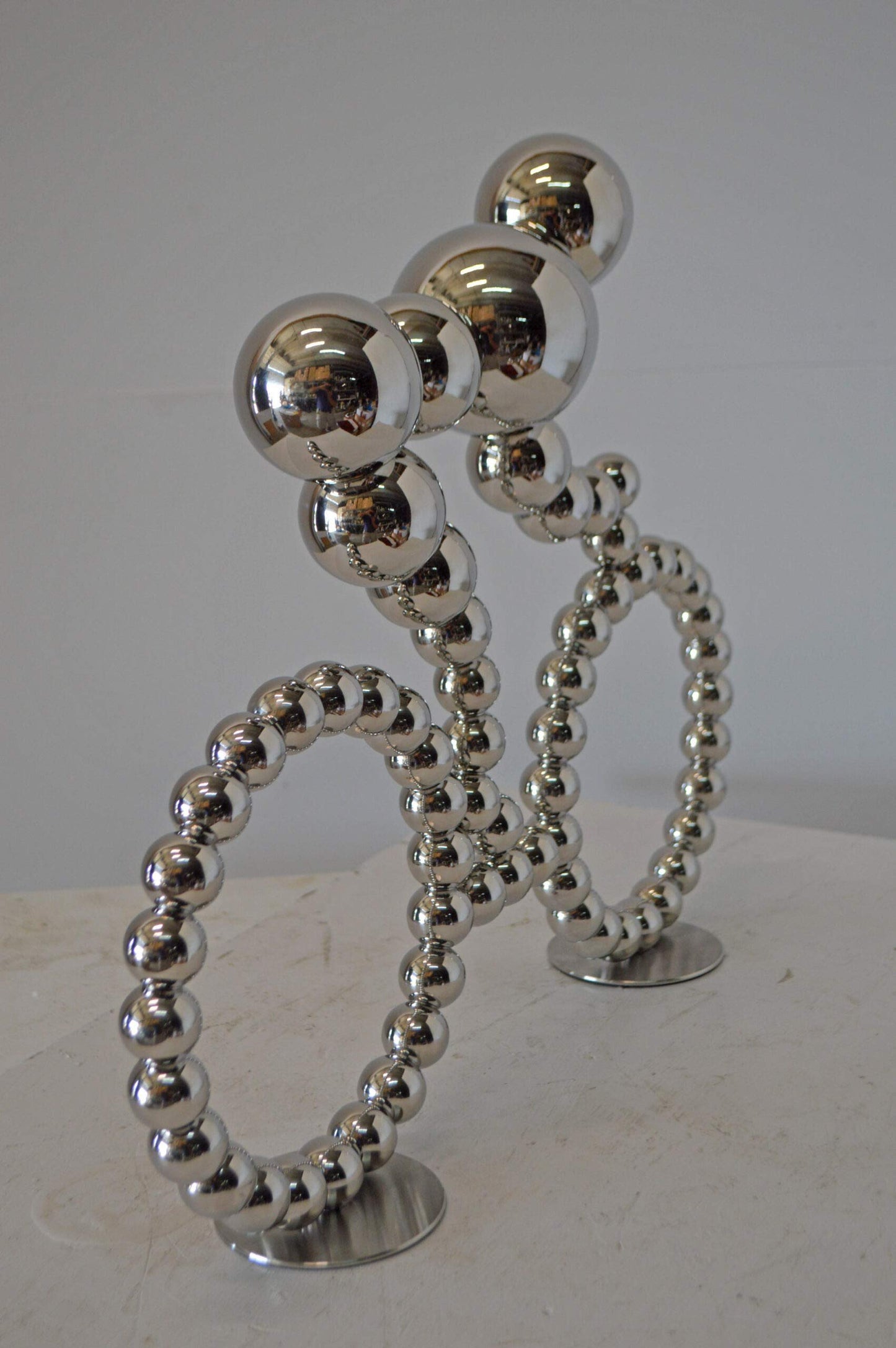 Modern Art Rider on His Bicycle Chrome Statue - Size: 22"L x 4"W x 17"H.