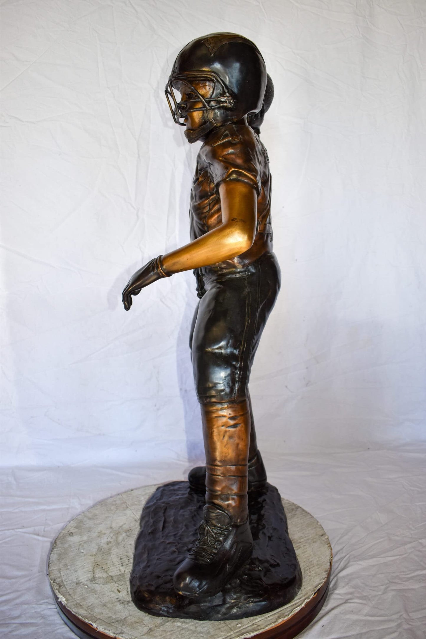 Young Boy Playing Football Bronze Statue Size: 26" x 14" x 43"H