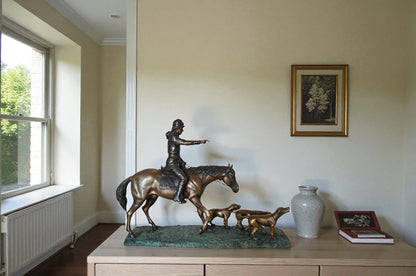 Hunter with three dogs Bronze Statue -  Size: 27"L x 6"W x 18"H.