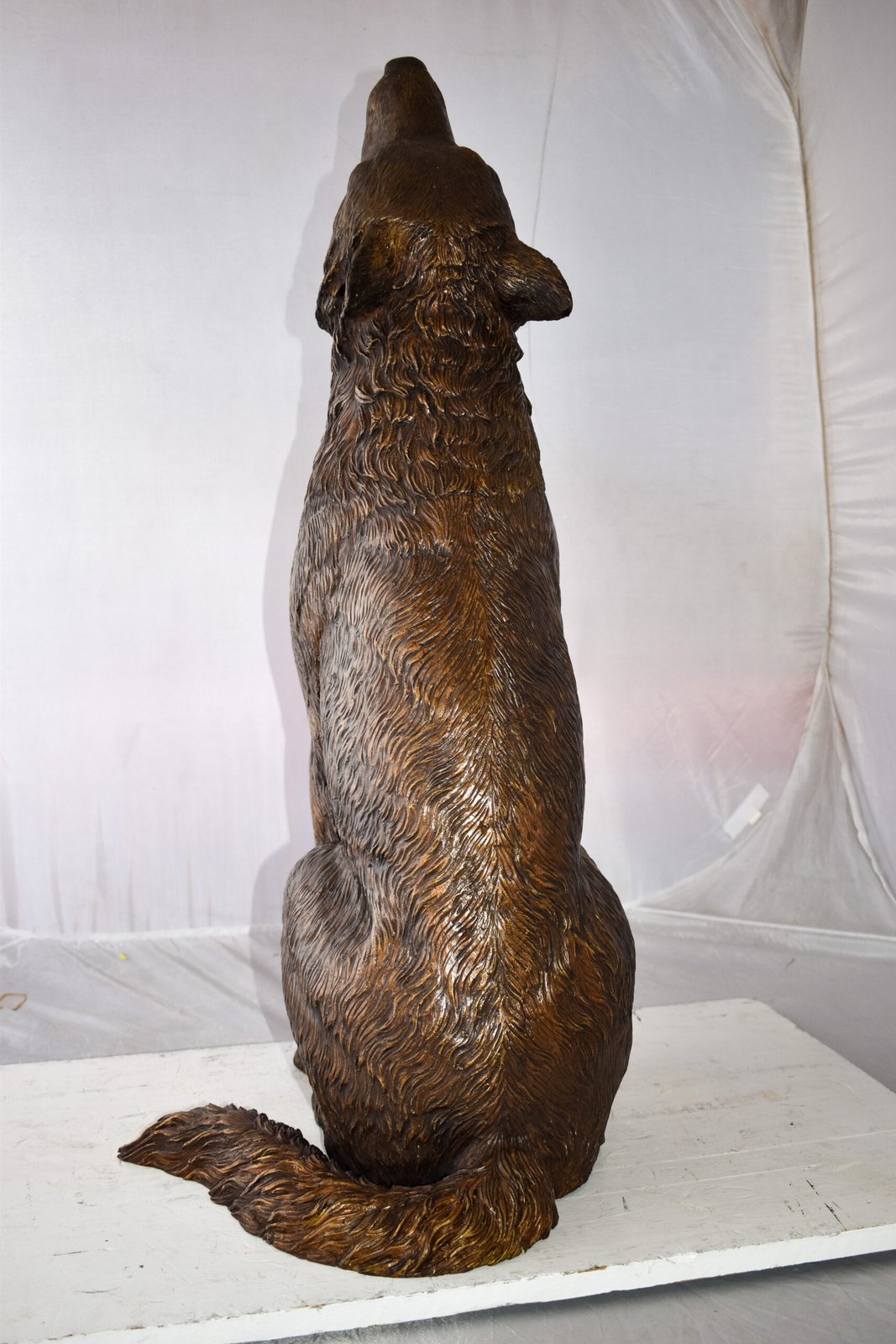 Howling Wolf looking toward the sky Bronze Statue Size: 19" x 19" x 37"H