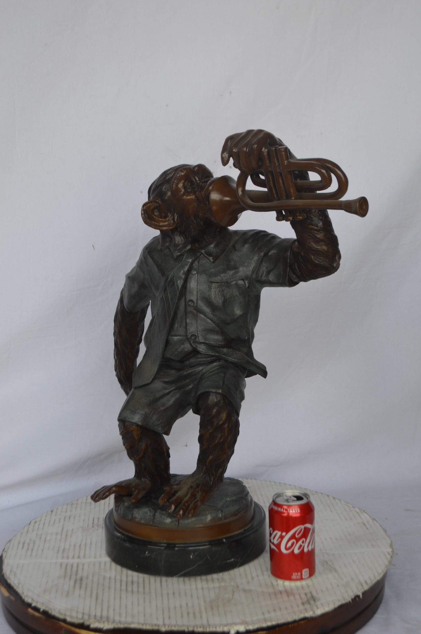 Monkey With Trumpet Bronze Statue - Size: 24"L x 12"W x 26"H.
