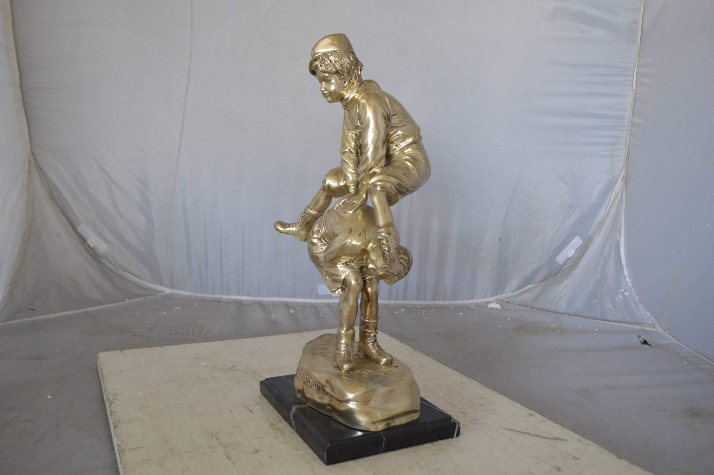 Leapfrog bronze statue silver finish  - Size: 12"L x 7"W x 19"H.