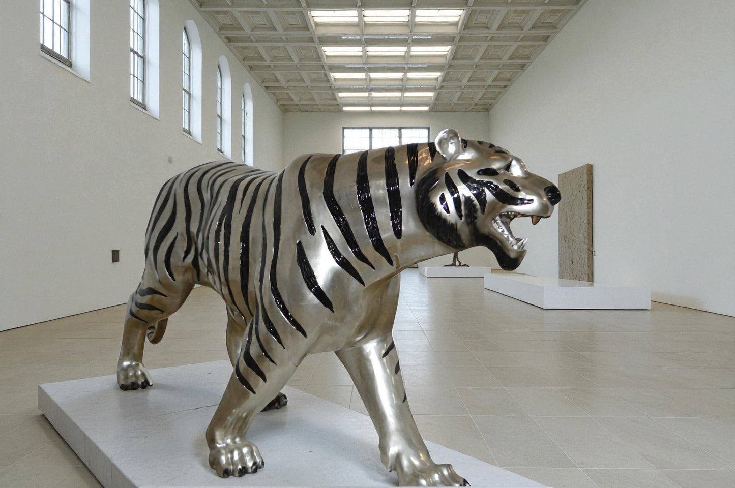 Tiger bronze statue with black and silver finish - Size: 80"L x 15"W x 34"H.