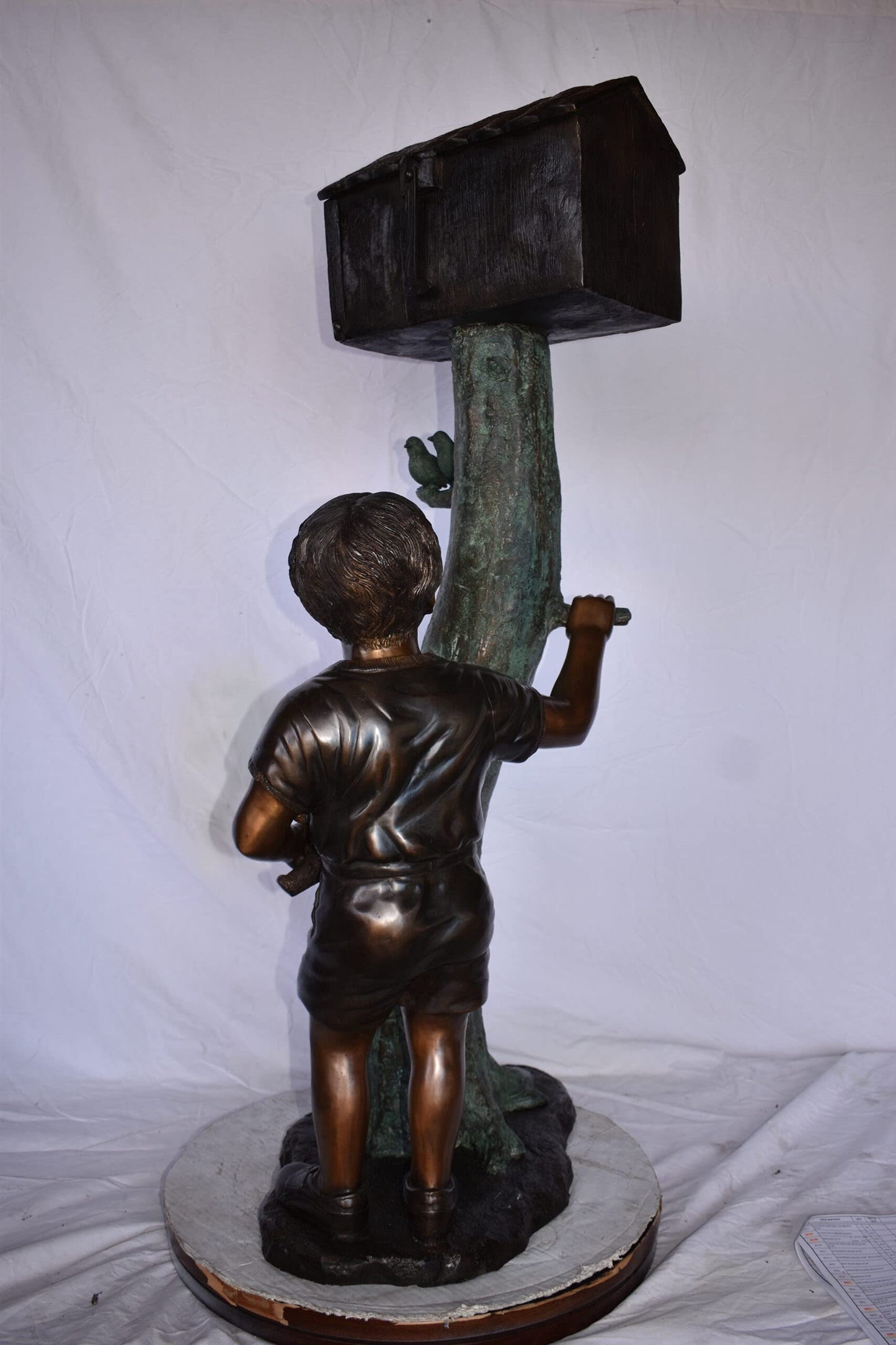 A Boy Standing by His Mailbox Looking at Birds Bronze Statue  25" x 22" x 51"H.