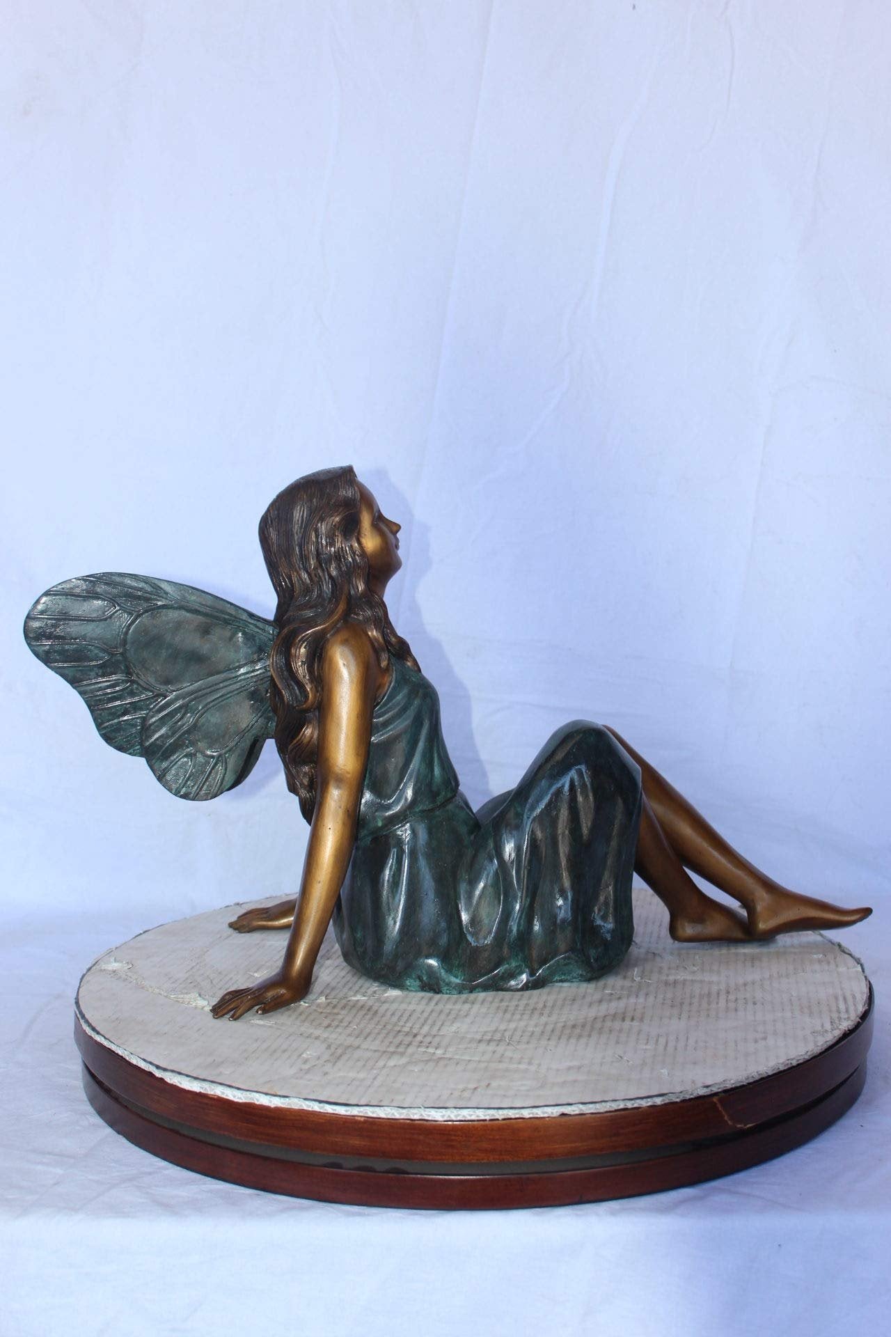 Fairy angel sitting peacefully bronze statue -  Size: 27"L x 12"W x 16"H.