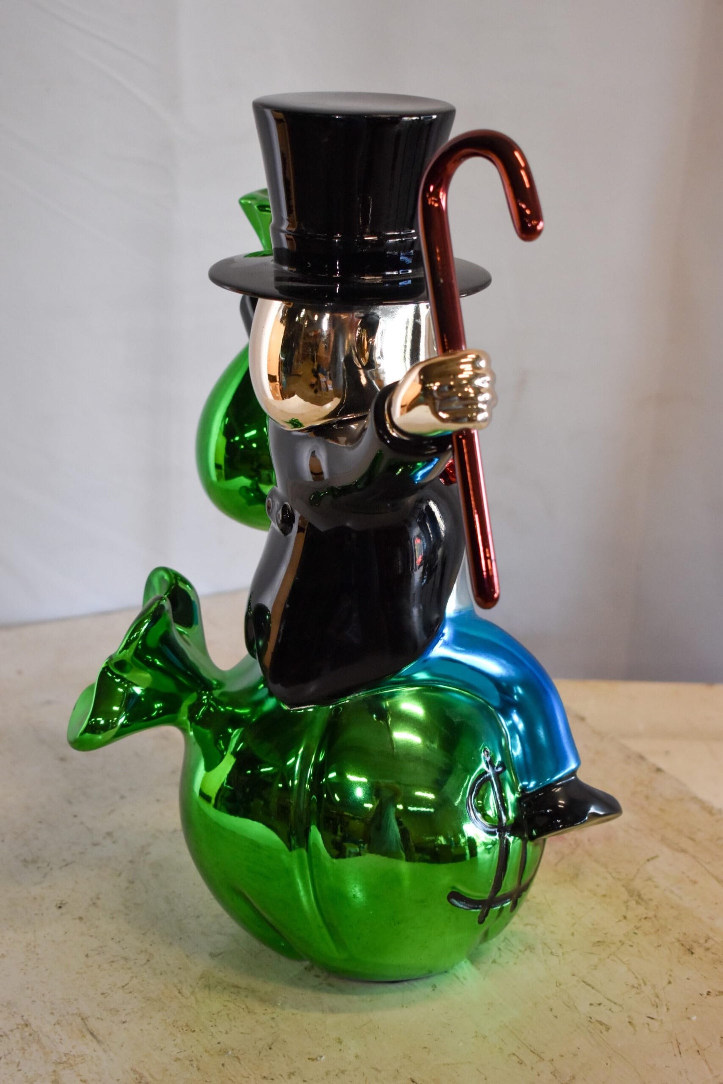 Joyous Monopoly Man Sitting on Money Bag Resin Statue 12" x 10" x 16"H