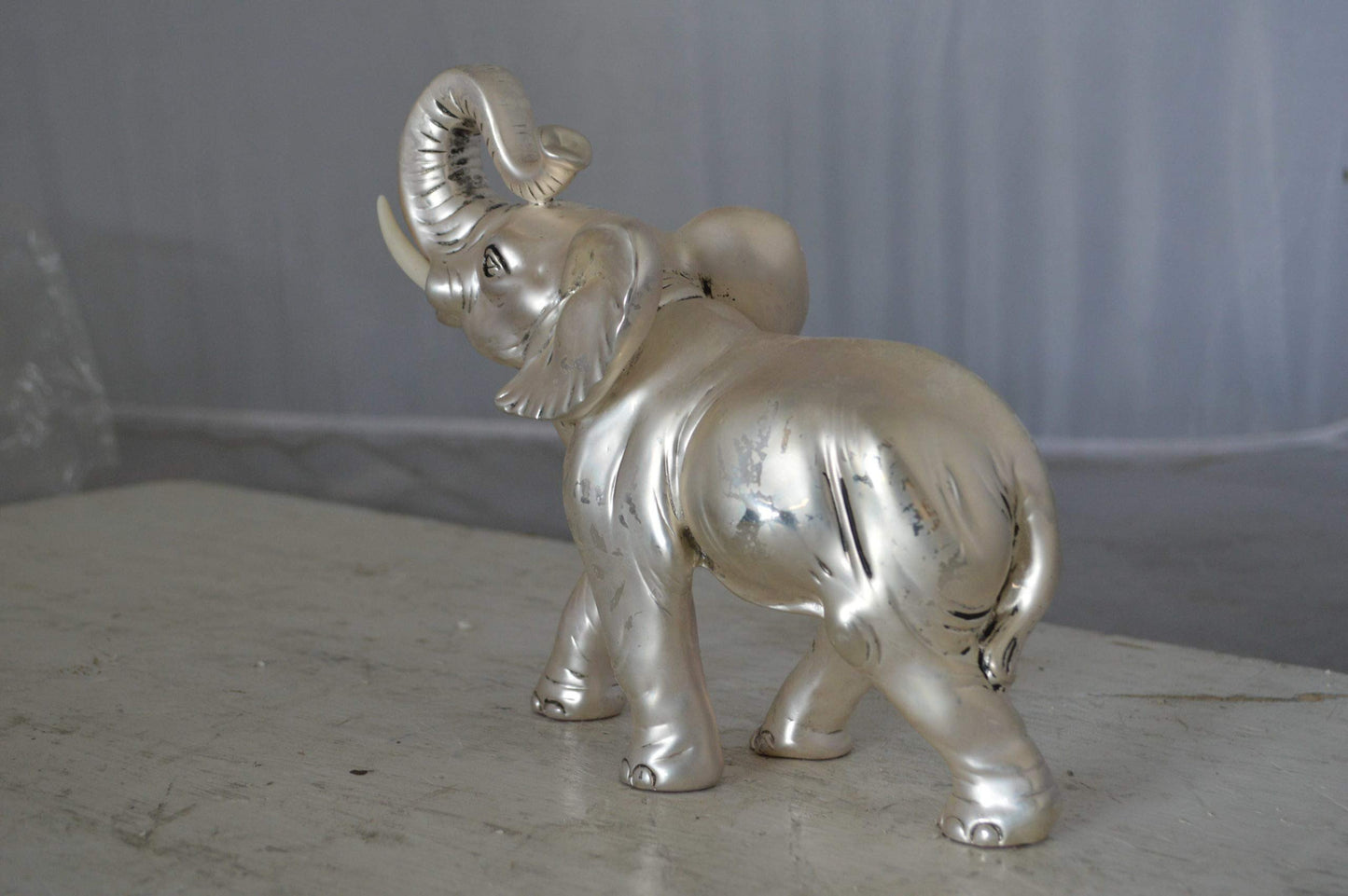 Elephant statue made of resin - Size: 9"L x 4"W x 8"H.