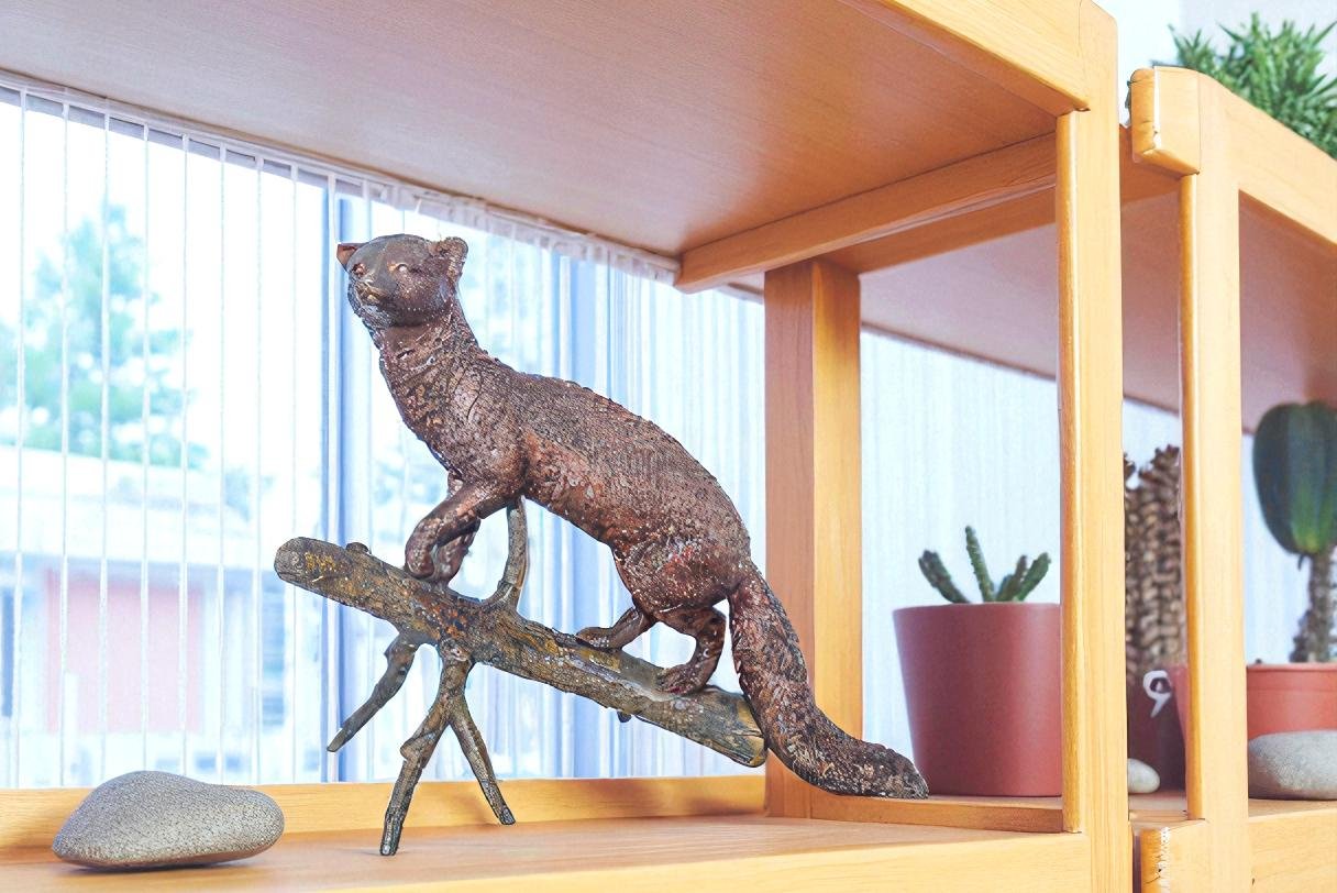Bronze Statue of a Mongoose Climbing a Tree Branch 24" x 12" x 20"H