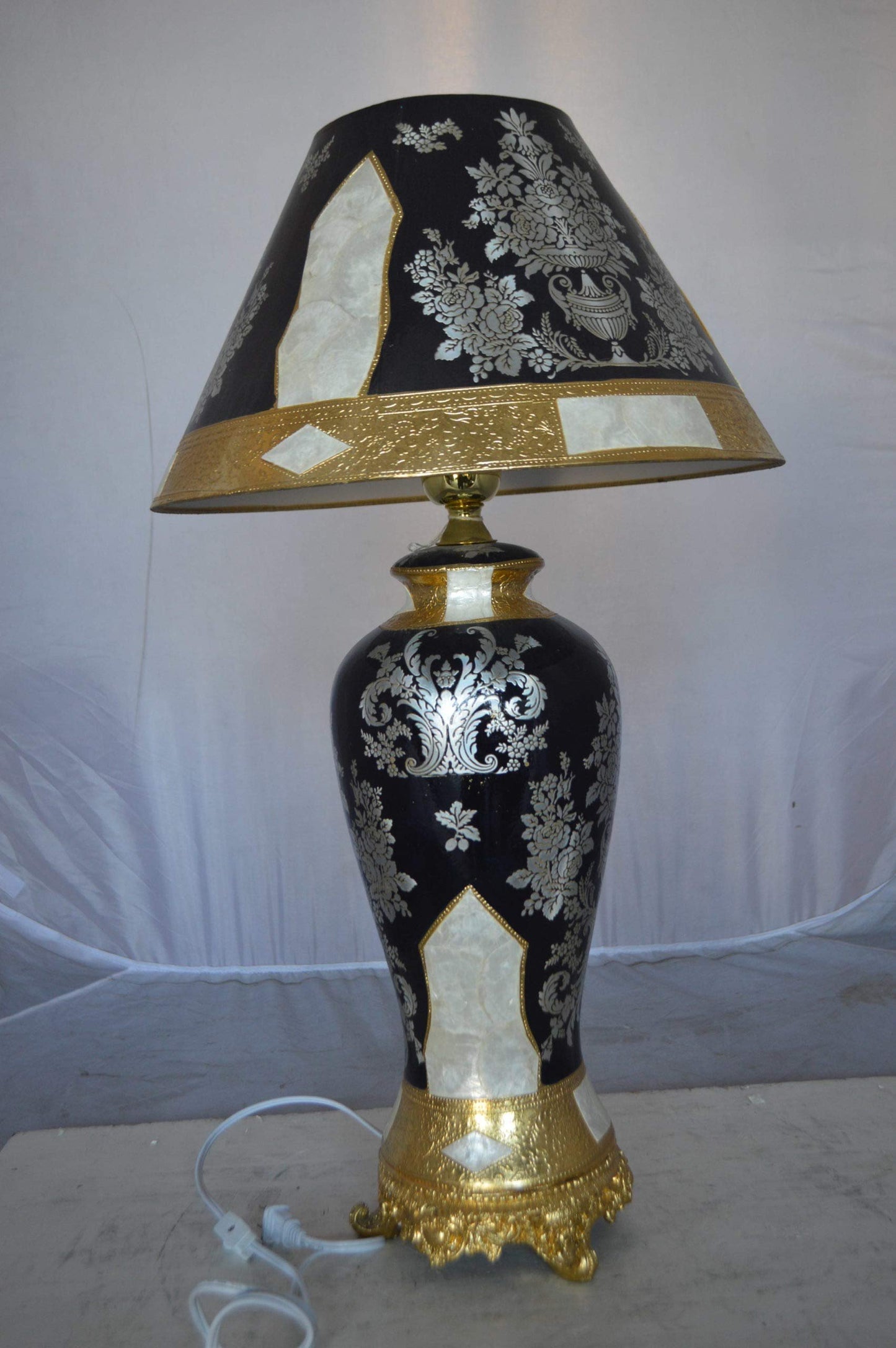 Gold and Silver lamp made of resin -  Size: 18"L x 18"W x 30"H.