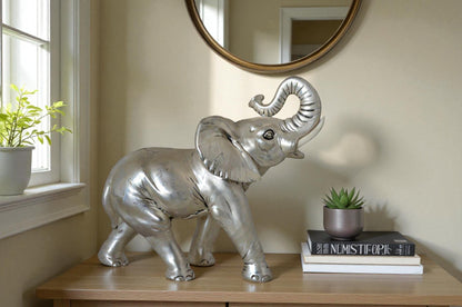 Elephant statue made of resin - Size: 9"L x 4"W x 8"H.