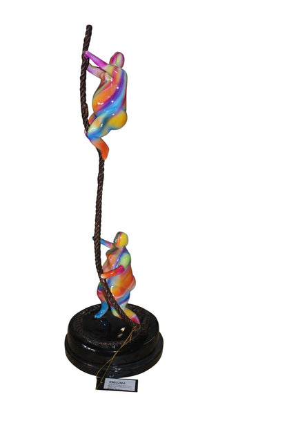 Two Fat Ladies Made of Bronze Climbing on Rope