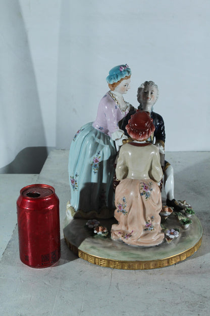 NIFAO Porcelain Figurine Group at Table with Cups 10"x10"x13"H
