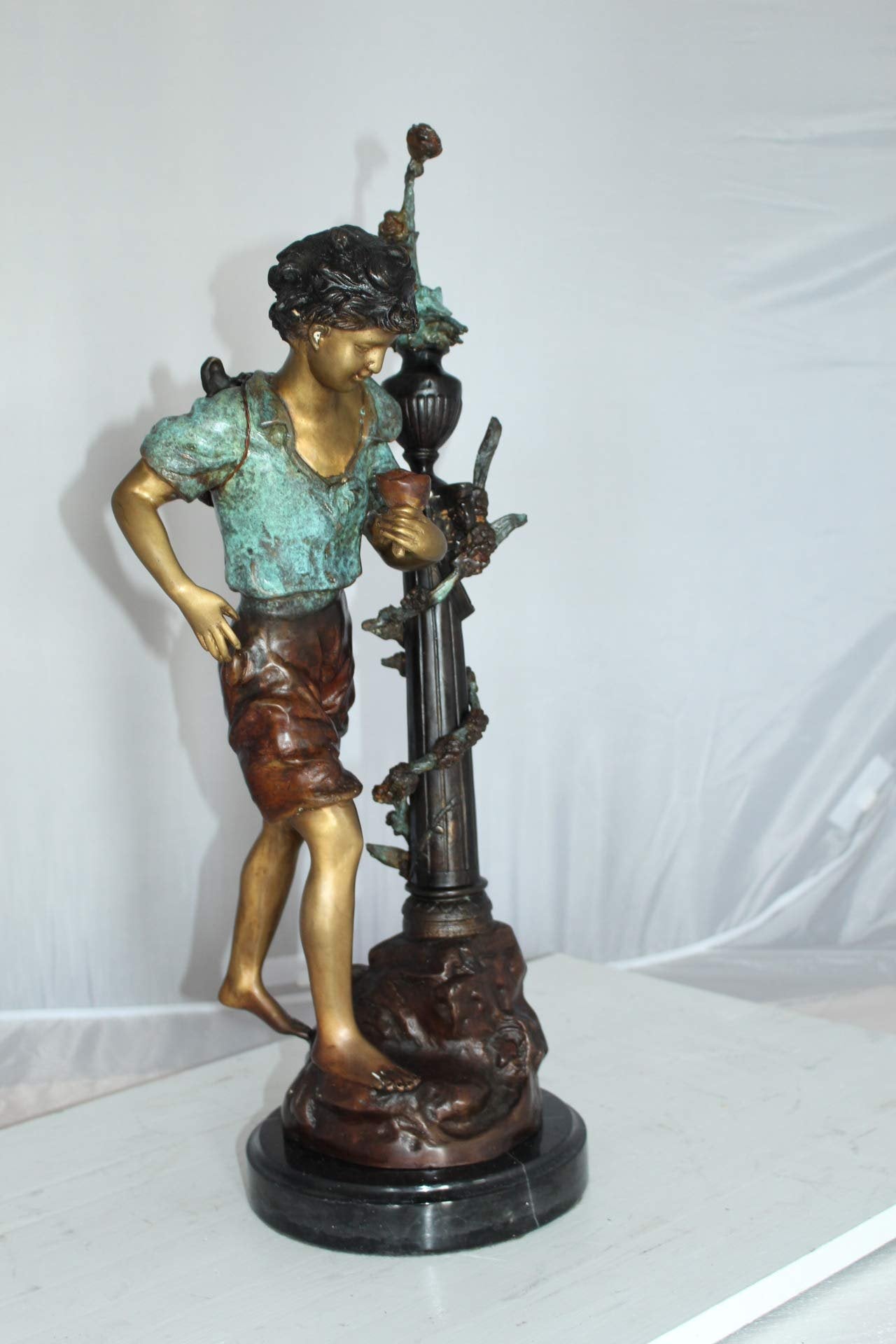 Les Amenes Boy Bronze Statue -  Size: 9"L x 8"W x 25"H.