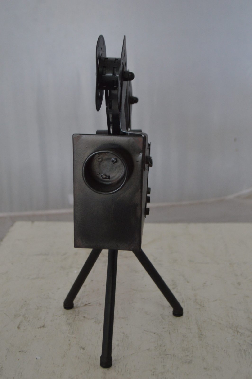 Movie Reel Abstract Metal Statue on tripod -  Size: 12"L x 6"W x 15"H.