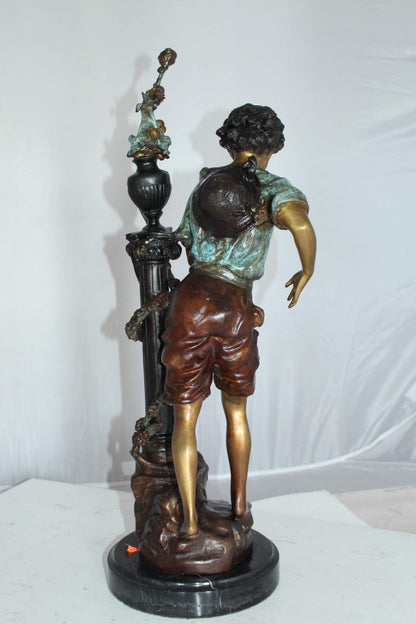 Les Amenes Boy Bronze Statue -  Size: 9"L x 8"W x 25"H.