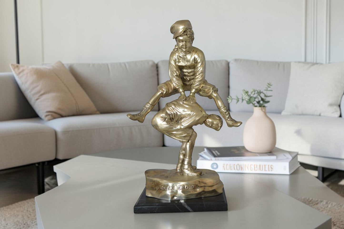 Leapfrog bronze statue silver finish  - Size: 12"L x 7"W x 19"H.