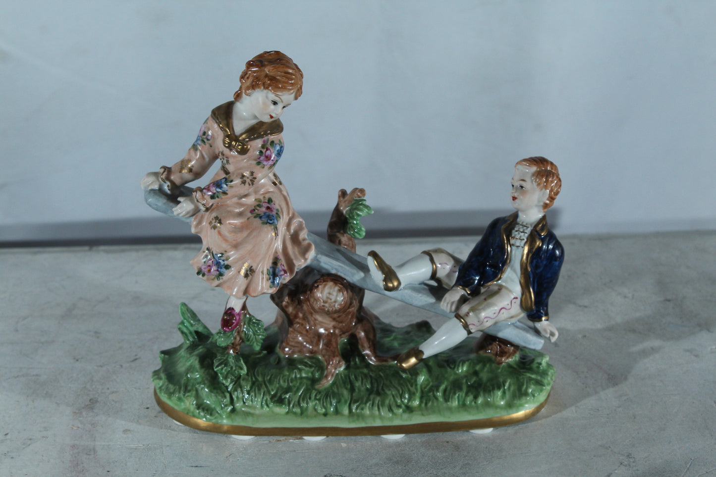 NIFAO Porcelain boy and Girl on Seesaw Figurine Vintage Style 10"x4"x9"H
