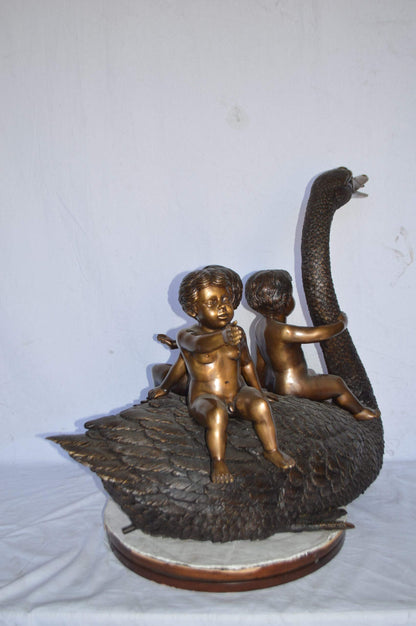 Swan Carrying Three Angels Bronze Fountain Art Nude - Size: 40"L x 23"W x 34"H.