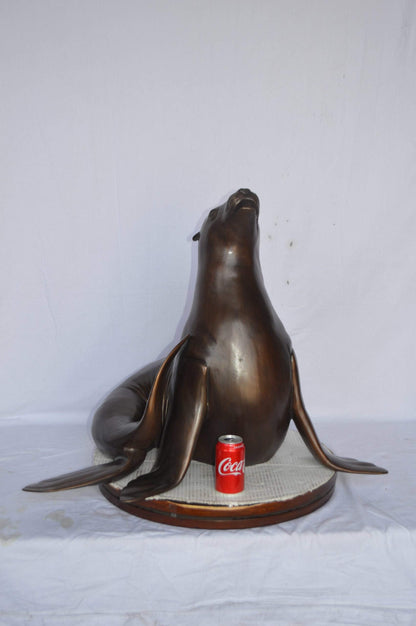 Seal Fountain made of bronze statue - Size: 35"L x 24"W x 27"H.