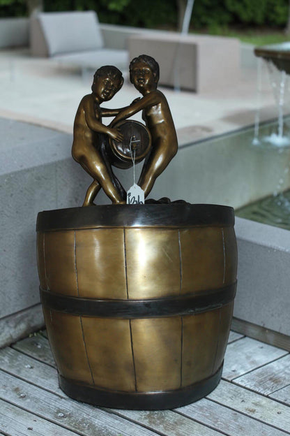 Two boys on a bucket self-contained fountain bronze statue -  16" x 16" x 29"H.