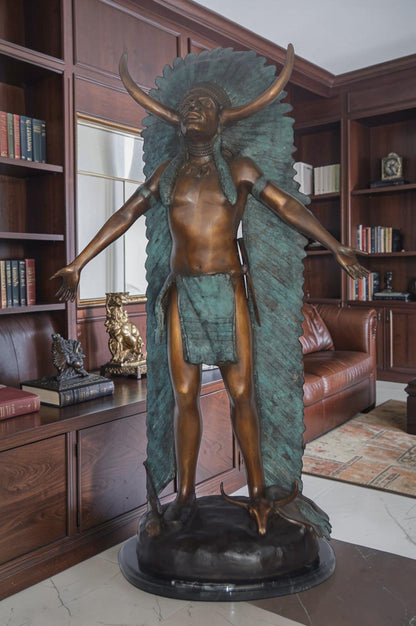 Indian with Plume bronze statue - Size: 22"L x 14"W x 38"H.