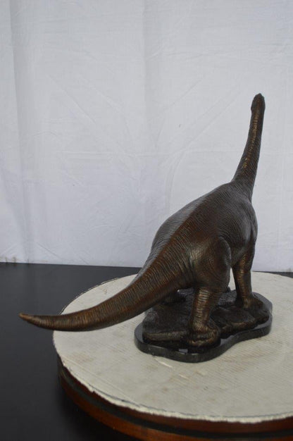 Brontosaurus Dinosaur Bronze Statue on Marble base -  Size: 26"L x 10"W x 16"H.