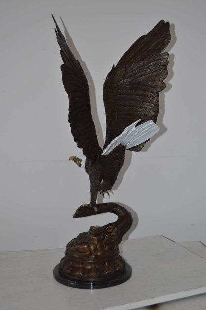 Eagle Coming to a Landing on a Branch Bronze Statue - Size: 15"L x 15"W x 31"H