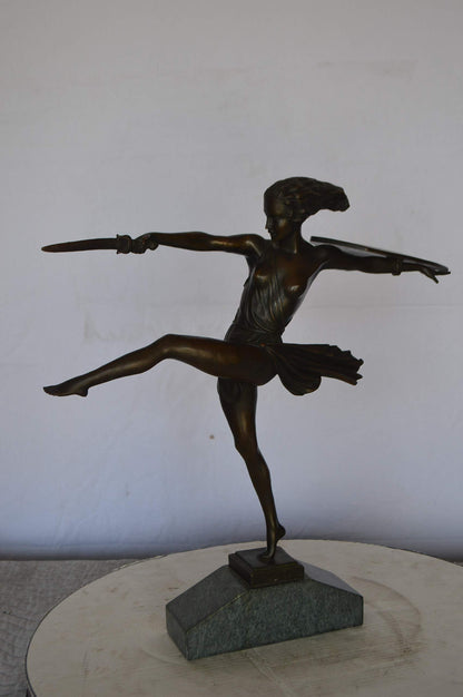 Woman Fighter with Sword Bronze Statue -  Size: 19"L x 5"W x 20"H.