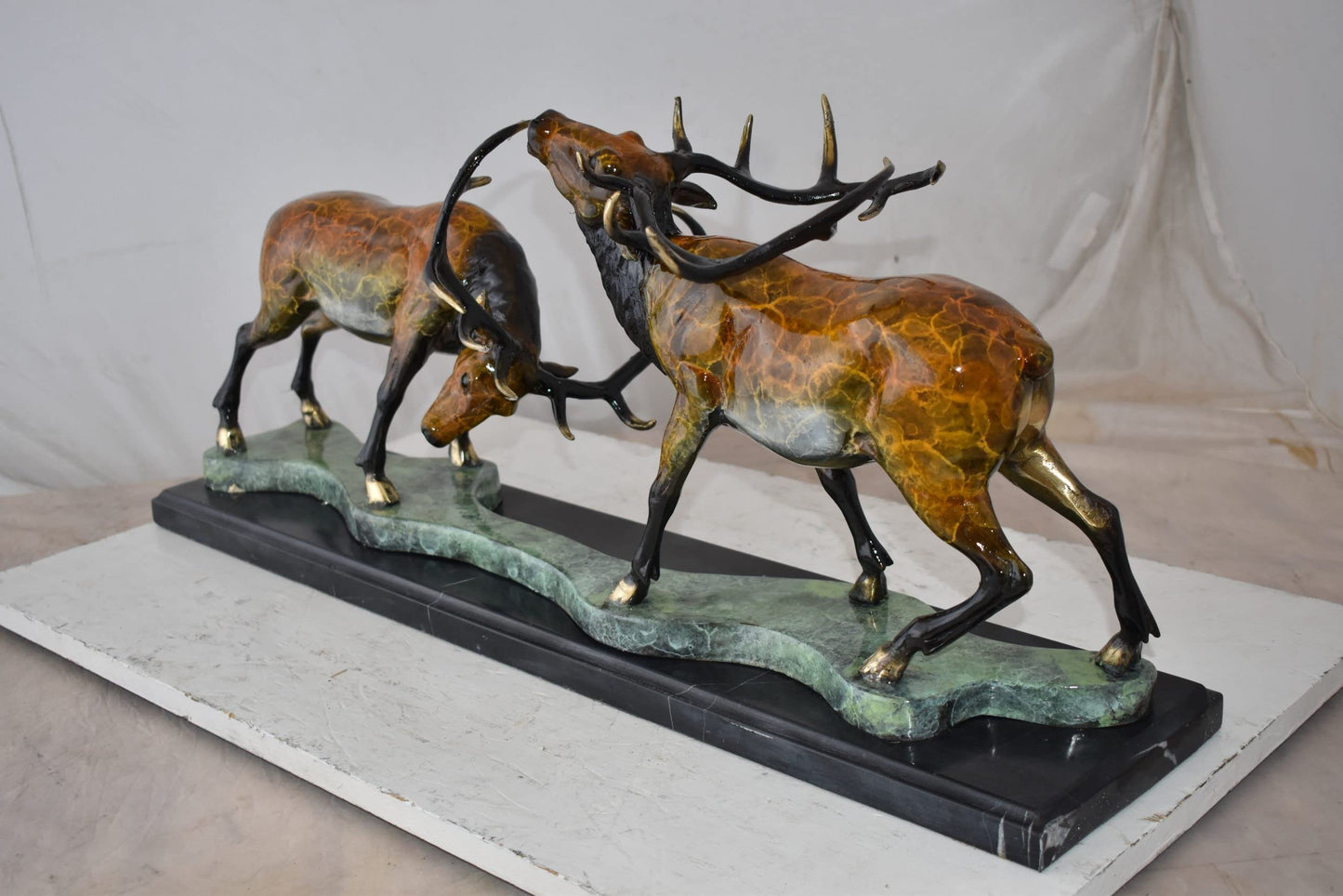 Fighting Deer Bronze Statue Mounted on a Marble Base Size: 32" x 8" x 14"H