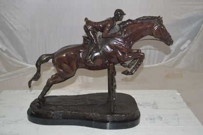 Jockey With Horse Jumping Over Hurdle Bronze Statue Medium  23"L x 10"W x 16"H.